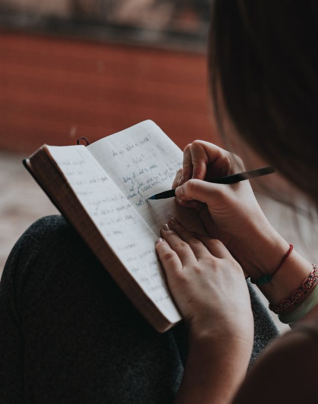 woman notebook content marketing works